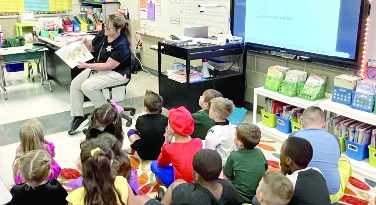 SBSO Public Information Officer Kim Gritter read several books to Joseph Davies Elementary students during a visit for Literacy Week.