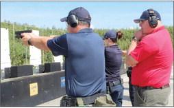 Dep. Jules Martin, who recently became SBSO’s newest Certified Firearms Instructor, works with deputies as they train at the Sheriff’s Office shooting range.