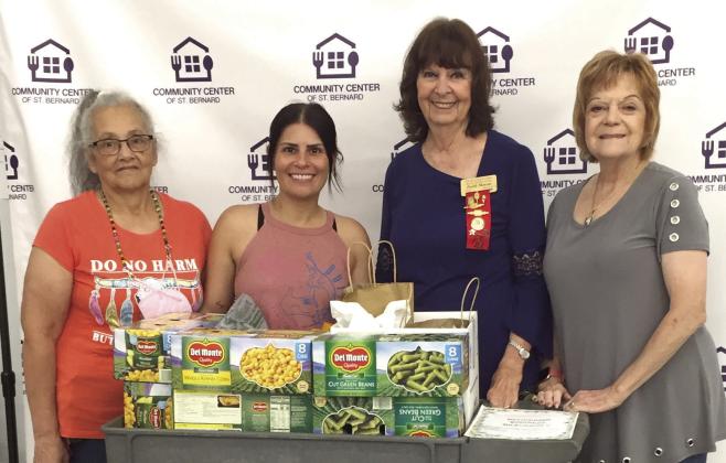 Upsilon Chapter of Delta Kappa Gamma Society International, as part of their 'Delivering Kindness Graciously' Project, donated food and toiletries to the Community Center of St. Bernard. The items were collected from members at the May 6 meeting held at the Kitchen Table Cafe in Arabi. Pictured, from left: Hope Larios, Jamie Richardson (Community Center Executive Director), Faith Moran, and Rosemary Gioia.