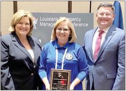 Pictured from left are Vicki Travis (LEPA President), Donna McClain and Casey Tingle (Director of the Governor’s Office of Homeland Security and Emergency Preparedness).