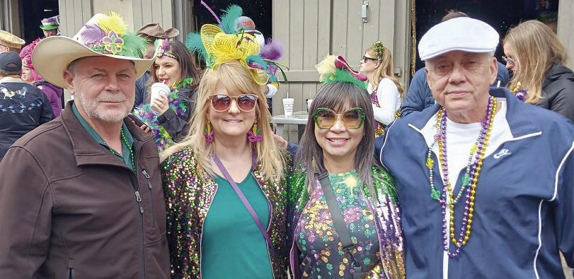 Even a St. Bernard cowboy Louie and friends Cheri, Keena and Norman celebrated Mardi Gras in the French Quarter.